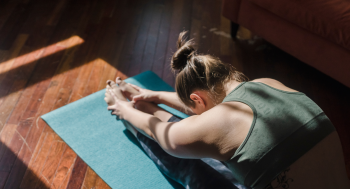 Woman practicing yoga in serene environment
