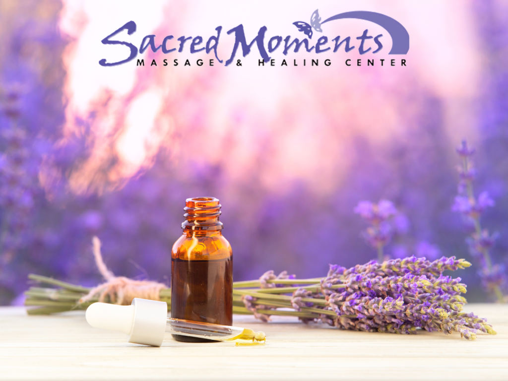 Woman enjoying a lavender facial at Sacred Moments Massage & Healing Center.