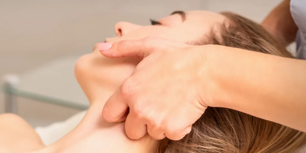 A facial lymphatic drainage massage at Sacred Moments Massage & Healing Center.