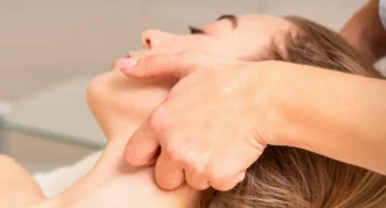 A facial lymphatic drainage massage at Sacred Moments Massage & Healing Center.